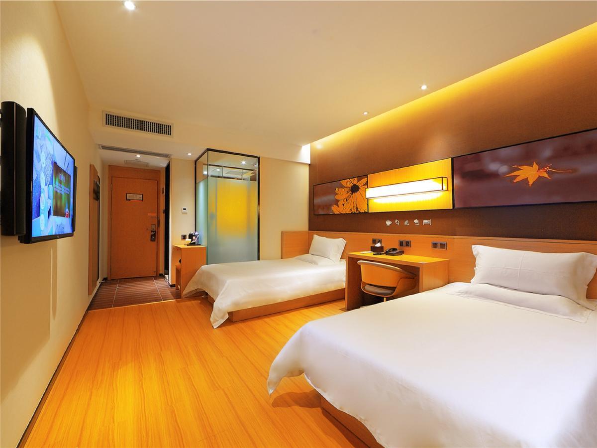 Iu Hotel Zhanjiang Haibin Avenue Xinhaimingchen Exteriör bild