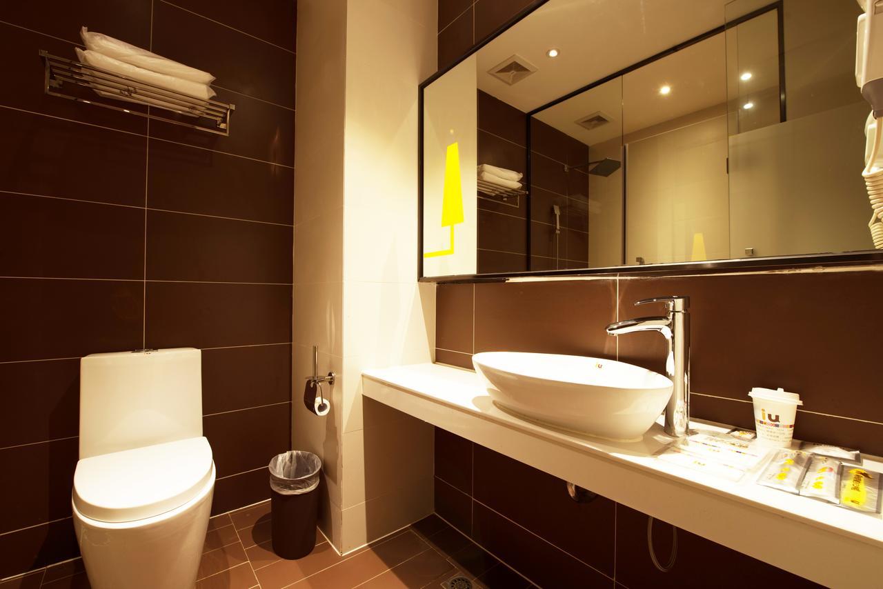 Iu Hotel Zhanjiang Haibin Avenue Xinhaimingchen Exteriör bild
