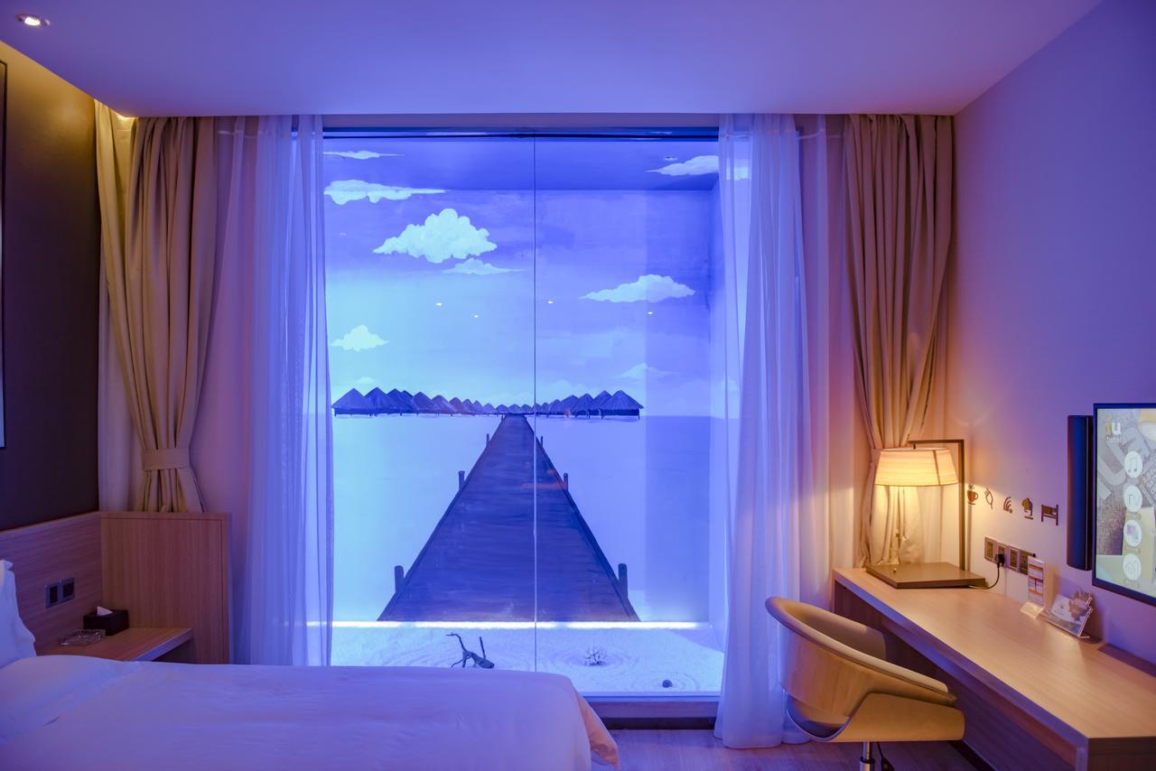 Iu Hotel Zhanjiang Haibin Avenue Xinhaimingchen Exteriör bild