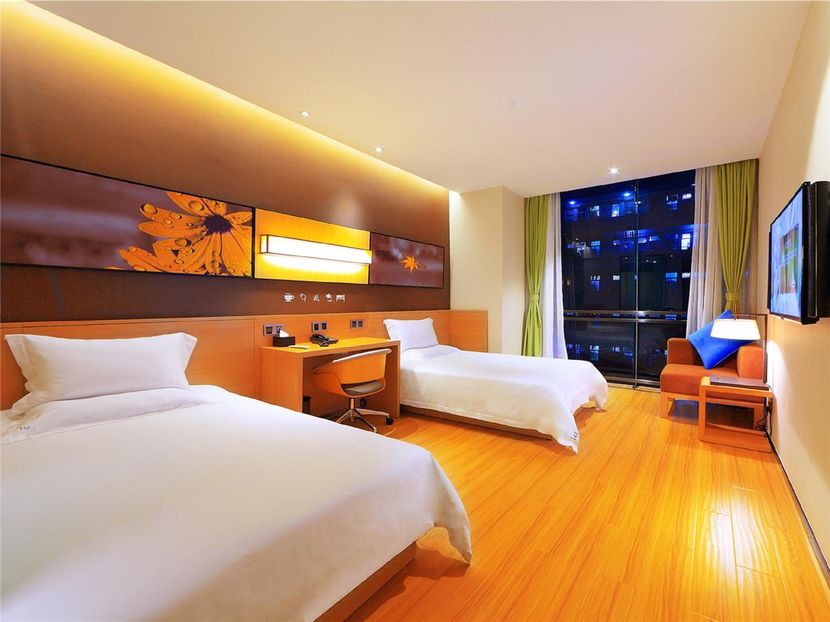 Iu Hotel Zhanjiang Haibin Avenue Xinhaimingchen Exteriör bild
