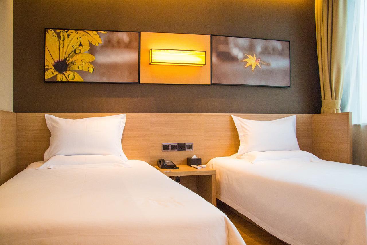 Iu Hotel Zhanjiang Haibin Avenue Xinhaimingchen Exteriör bild